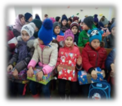 An image of children from the local school at Pastor Misha's church for their Christmas service.