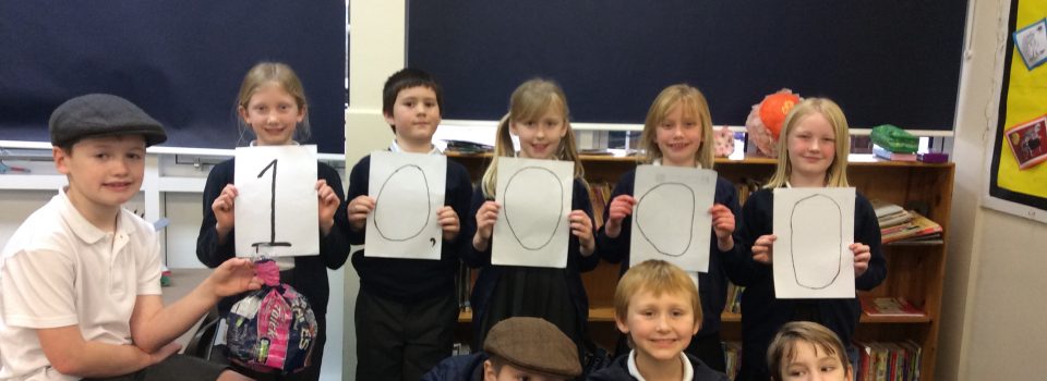 Junior SOUP leader & pupils at Bromley Heath Junior School holding a 10,000 bag target.